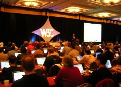 Steve Bratt on stage, plenary from behind